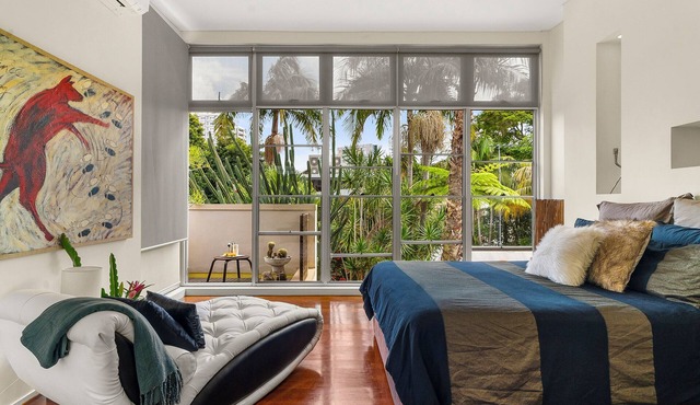Historic sandstone home with designer interior & tropical garden. pets welcome!