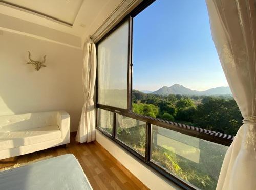 Serene Hill view 1BHK I Pool & Gym I Udaipur