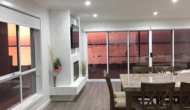 Stunning waterfront home situated amid the Black Bull Golf Course & Sebel Resort