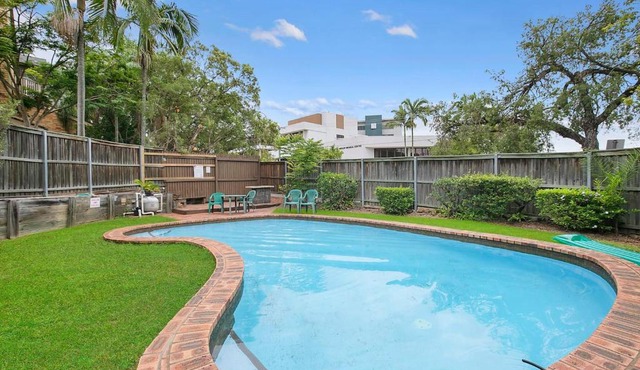The Poolside Perch - A Breezy Balcony Gem