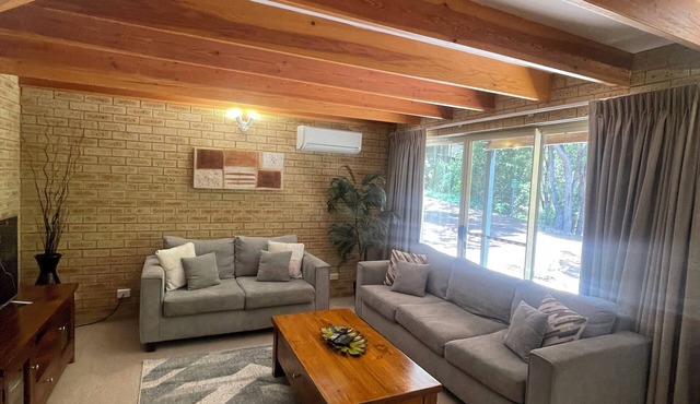 Tranquil forest retreat, 800 meters from town centre.