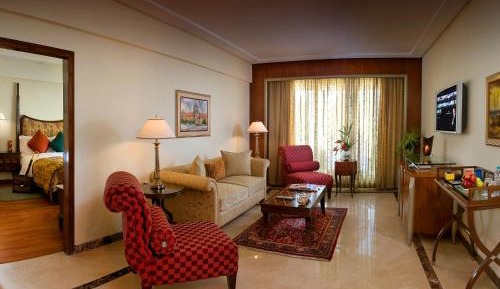 Lalit Executive Suite, King Bed with Complimentary One way Airport Transfers , 15% off on session on Spa and Enjoy Happy Hours with 1+1 offer on Beverages