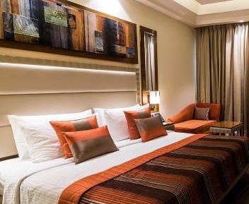 Executive Queen Room - Non-Smoking with 15 % OFF ON FOOD & Soft beverages/15% off on Laundry services//1+1 happy hours at Kokkinos from 6-8 pm on IMFL drinks// INR 500 SPA discount